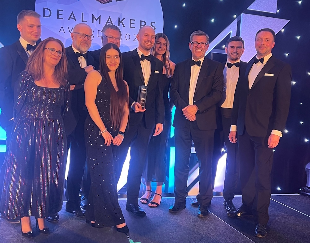 A photograph showing 10 members of the Thrings team, in black tie, smiling at the Awards ceremony