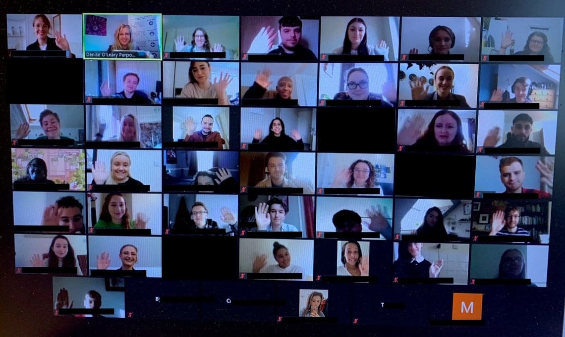 A photograph of an online meeting of a former Kickstart My Career cohort. The photo features around 40 people as shown by their cameras online.