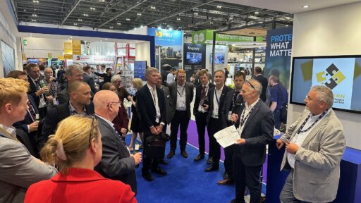 Attendees gather at the launch of the Western Regional Defence and Security Cluster (WRDSC), held at the Southern Manufacturing & Electronics event. Representatives from defence and security sectors across the South West listen to a speaker, with exhibition booths and branding visible in the background.