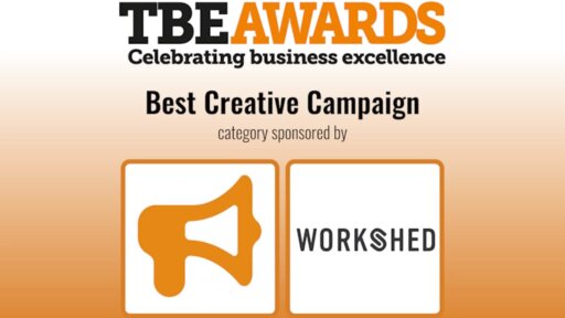 Promotional graphic for the TBE Awards, featuring the category "Best Creative Campaign" sponsored by WORKSHED. The design includes bold black and orange text reading "TBE AWARDS – Celebrating business excellence." Below, the award category is highlighted with the phrase "category sponsored by" and the WORKSHED logo, which incorporates a stylized orange megaphone and a custom "S" replacing the "O" in WORKSHED.