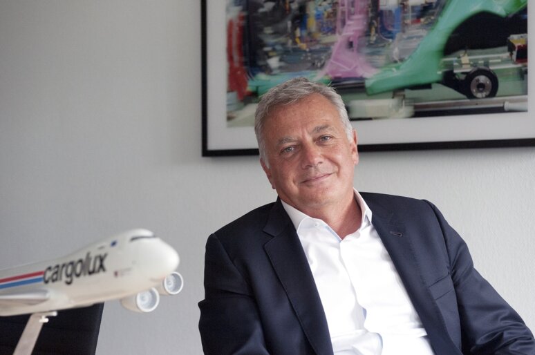 Jason Holt, the new Chairman of the Board, Bristol Airport - wearing white shirt and suit