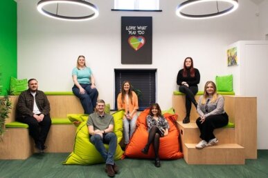 A group photo of the Gel Studios team - some sitting on bean bags