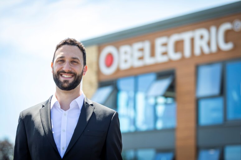 BELECTRIC UK CEO Daniel Kiremidjian smiling and standing outside the company offices